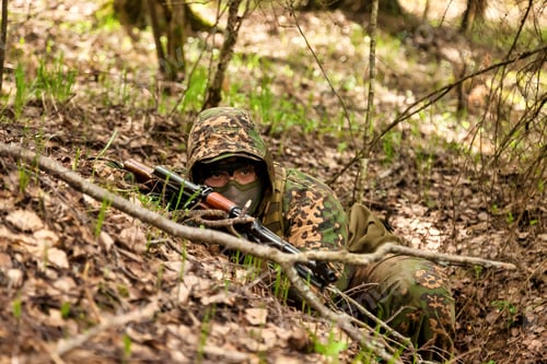 Preview: Ukrainian soldiers man dressed military disguise camouflage uniform with weapon in woodland
