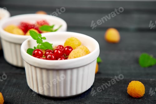 Preview: Healthy breakfast on white bowls.