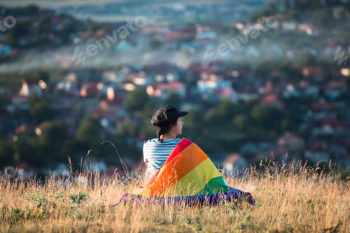 Preview: Young woman with LGBT flag.