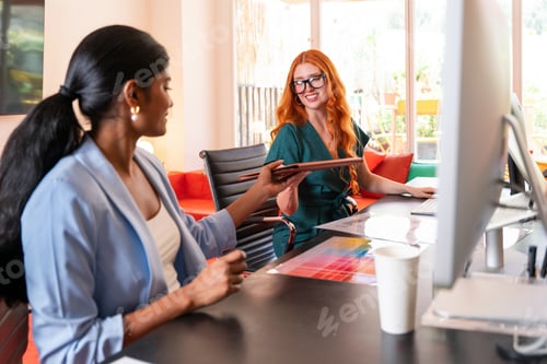 Preview: Multiethnic small group of businesspeople meeting in a coworking company office