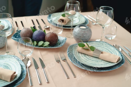 Preview: Luxury green table setting decorated with candles