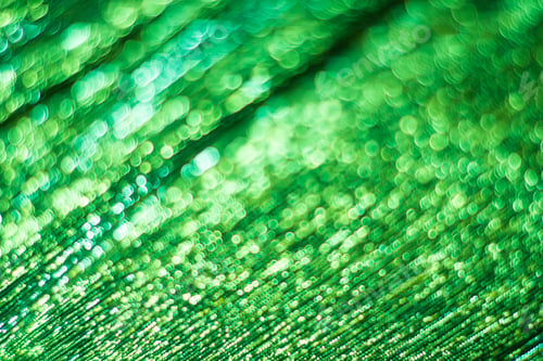 Preview: Green bokeh. Abstract background. Defocused lights.
