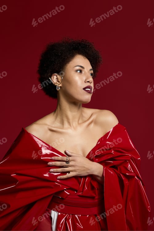 Preview: Bold elegance shines through a striking young womans fashion statement in deep red hues