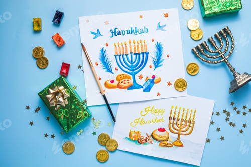 Preview: Top view of a watercolor art Happy Hanukkah
