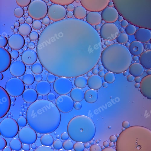 Preview: oil and water bubbles are making a colorful background for the blue background