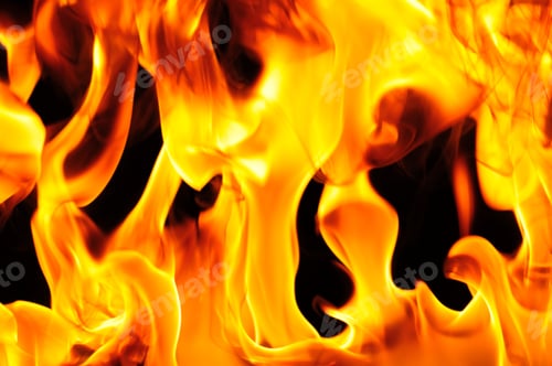 Preview: Flame burns close up on black background