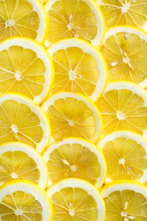 Preview: A slices of fresh yellow lemon texture background pattern.