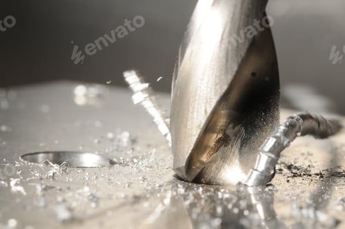 Preview: Close-up of drilling process and metal chips