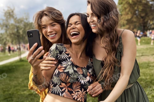 Preview: Group of friends making selfie at music festival