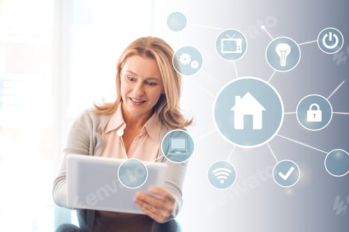 Preview: pretty blonde woman using digital tablet, smart home concept