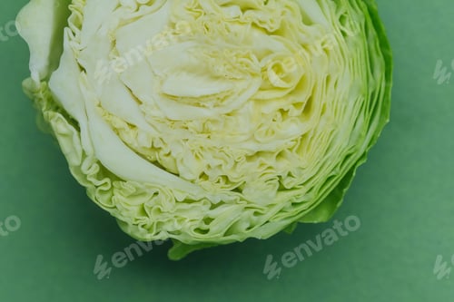 Preview: Closeup of halved cabbage showing detailed leaf structure