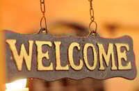 Preview: Welcome Sign Hanging With a Warm Glow