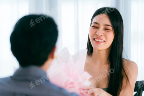 Preview: romantic love anniversary celebration of young asian couple, woman and man happy together