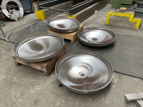 Preview: four stainless steel bowls, with various other metal objects and equipment scattered around