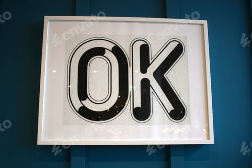 Preview: Framed black and white Ok sign with teal background