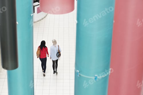 Preview: Two young women walking, high angle