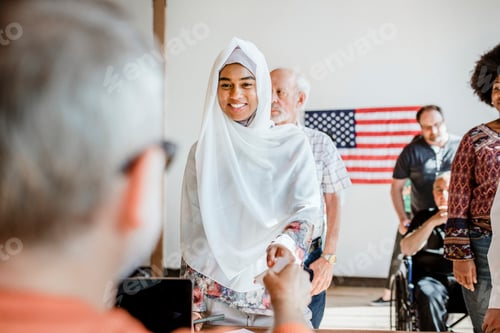 Preview: American Muslim queuing at a polling place