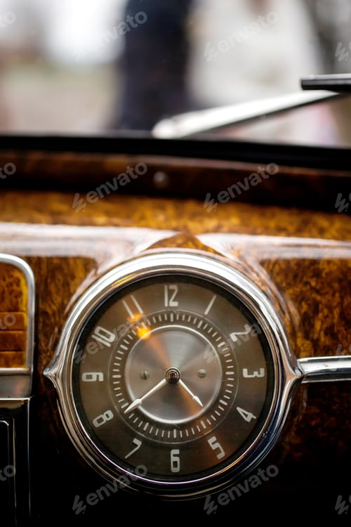 Preview: Vintage car brown marble dashboard with retro gauges.