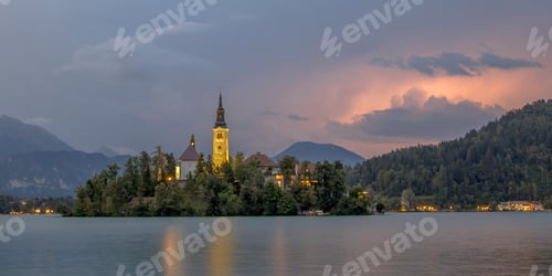 Preview: Lake bled with church under storm