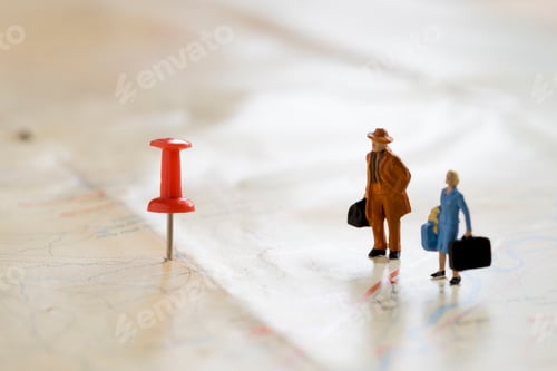 Preview: Figture traveler with red pushpin and a map travel concept.