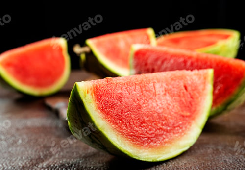 Preview: Fresh sliced watermelon on dark background