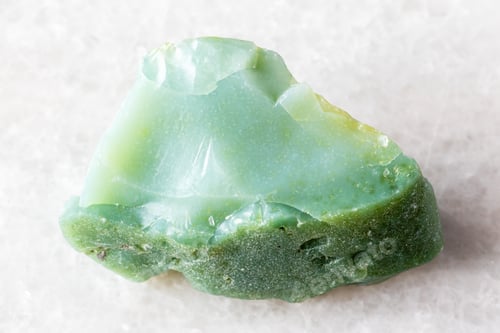 Preview: sample of raw chrysoprase rock on white marble