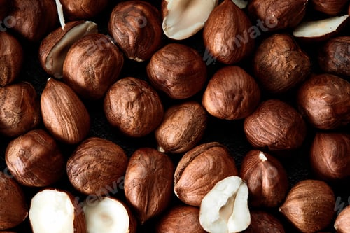 Preview: Close up of Hazelnut kernels - Food Frame Background, macro detailed close up.