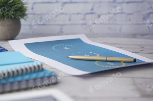 Preview: financial graph, calculator and notepad on table
