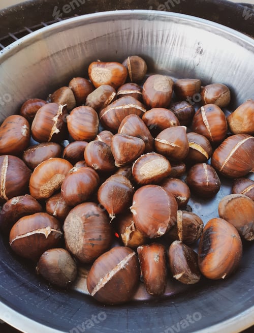 Preview: Roasted chestnuts in an iron pan