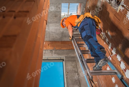 Preview: Contractor on a Ladder Inside Newly Constructed Building