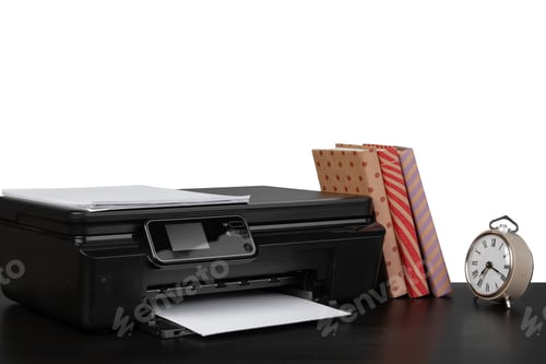 Preview: Working table with printer and stacked books on white abckground