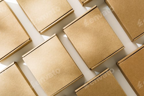 Preview: Brown cardboard boxes arranged on a neutral background in a warehouse setting during daylight hours