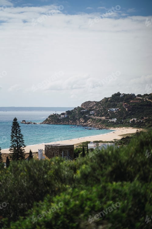 Preview: Vertical shot of people relaxing on Bolonia beach in Tarifa, Spain