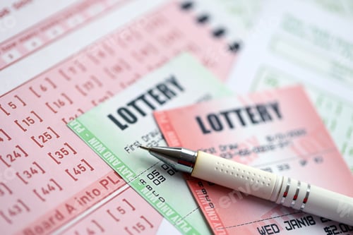 Preview: Green and red lottery tickets with pen on blank bills with numbers for playing lottery
