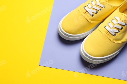 Preview: Bright stylish shoes on color background. Space for text