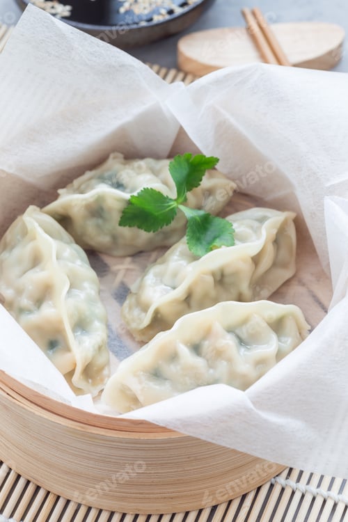 Preview: Steamed Korean dumplings Mandu with chicken meat and vegetables