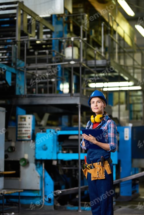 Preview: Young Woman Working in Factory