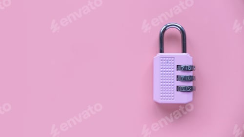 Preview: Safety and protection concept. Pink padlock isolated on a pink background with copy space.