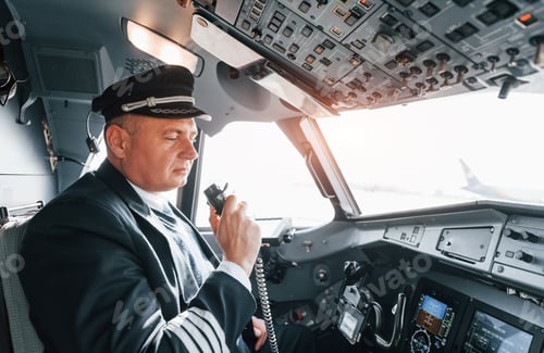 Preview: A professional pilot is in the cockpit. Conception of work