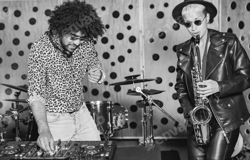 Preview: Young multiracial people mixing new music album inside recording studio