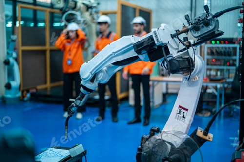 Preview: A group of Robotics engineers working with Programming and Manipulating Robot Hand