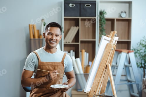 Preview: artist painting on canvas in the home studio, fine arts and creativity concept.