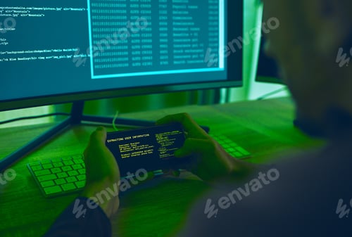 Preview: Computer hacker, coding and a man with phone for phishing, scam or cybersecurity software. Online c