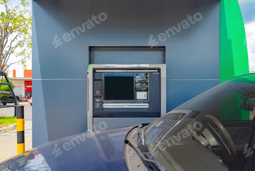 Preview: ATM drive through machine with a car, screen at service station. Cash withdrawal with a card.