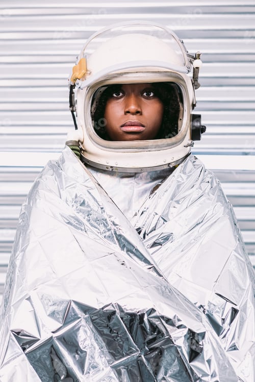 Preview: Black astronaut wrapped in emergence blanket