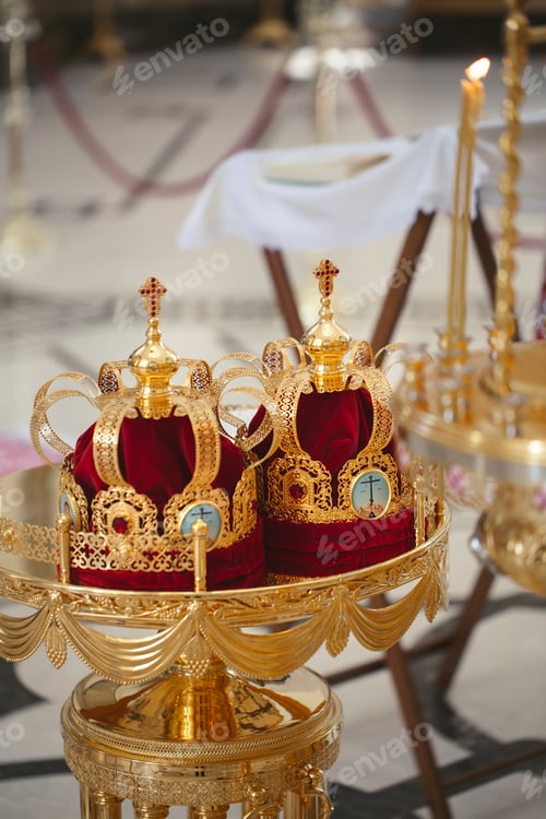 Preview: Wedding golden crowns ready for wedding ceremony in orthodox church.