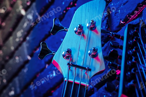 Preview: Guitar headstock with tuners on dark background