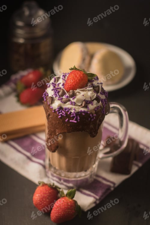 Preview: Closeup of tasty chocolate cocktail with strawberry