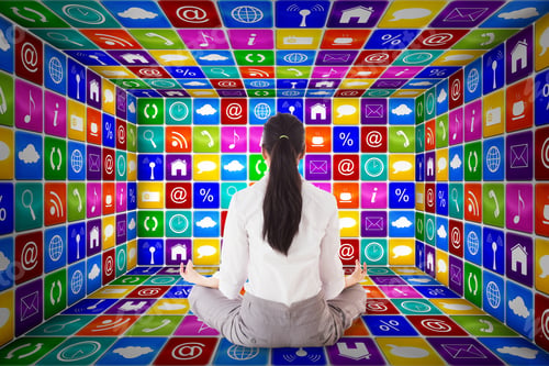 Preview: Businesswoman Sitting In Lotus Pose Against App Room