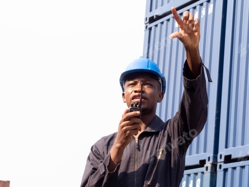 Preview: Labor engineer blue hardhat helmet safety person pointing finger talk talkie wakie staff employeee s